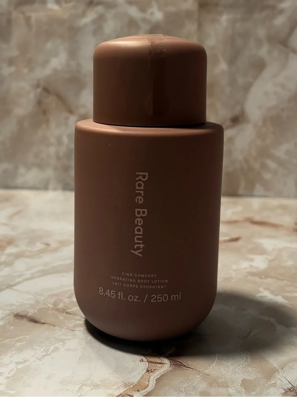 Rare Beauty Hydrating body — Brown